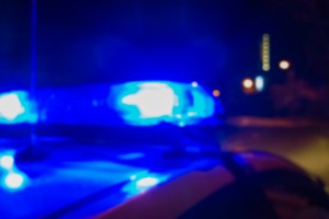 police car responding to emergency at night