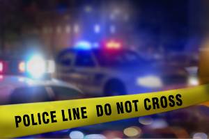 police cars behind do not cross line