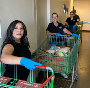 Phillips Law Group volunteers working at NourishPHX