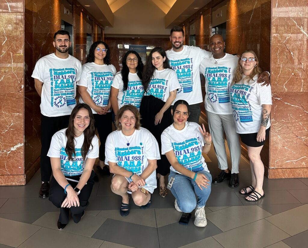 image of Phillips Law Group staff members wearing Suicide Awareness week shirts