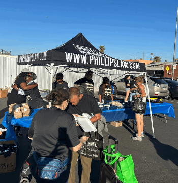 A Phillips Law Group tent set up at community outreach event