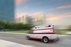 ambulance on road during evening