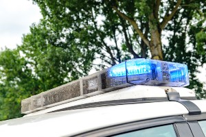 police car at scene of single-vehicle crash