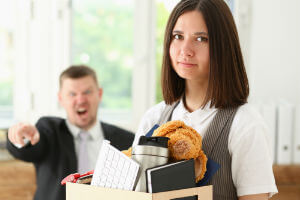 employee carrying box after being fired