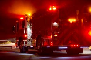 fire truck on road at night