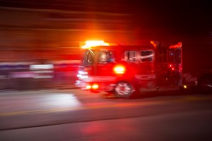 firetruck rushing to the scene of an emergency call