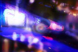 blue and red police lights on top of car