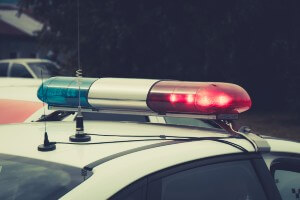 flashing police car lights early morning