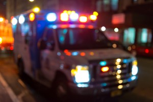 img of ambulance responding to night incident