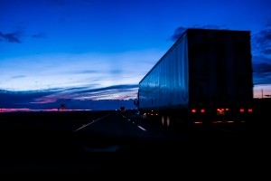 semi-truck on interstate at night