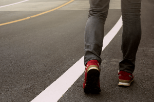 man crossing road