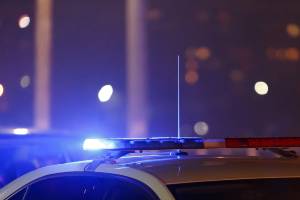 police car on road at night