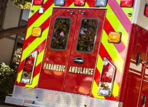 backside of ambulance on street