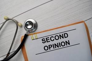 stethoscope next to folder for second opinion