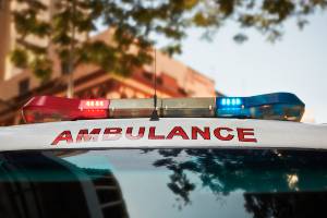 pic of top of ambulance with red and blue lights